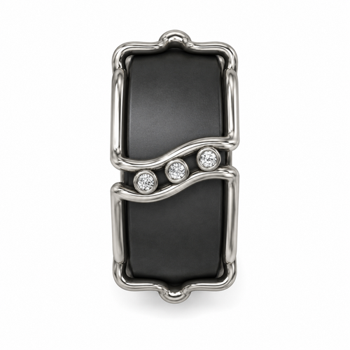 Jewelry charm with black stone and silver accents on a white background